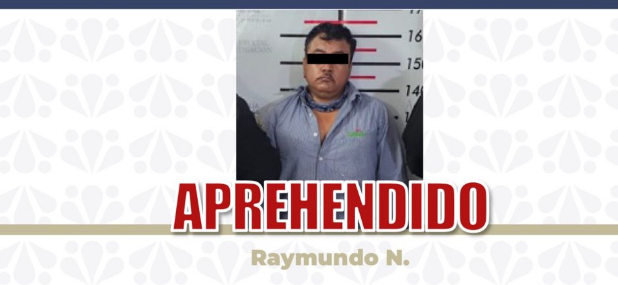 Elementos de la Fiscalía realizan un operativo de detención.