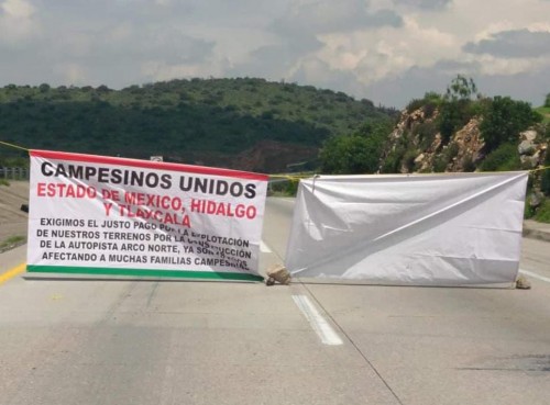 Continúa bloqueo en Arco Norte, ejidatarios exigen respuesta de López Obrador